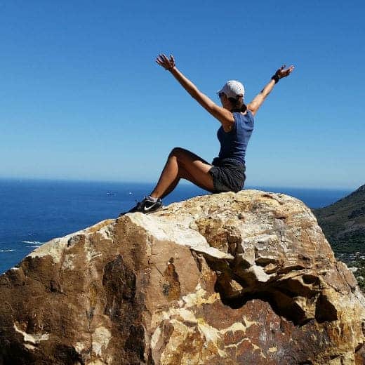 Mountain Climber Enjoying Scenic View