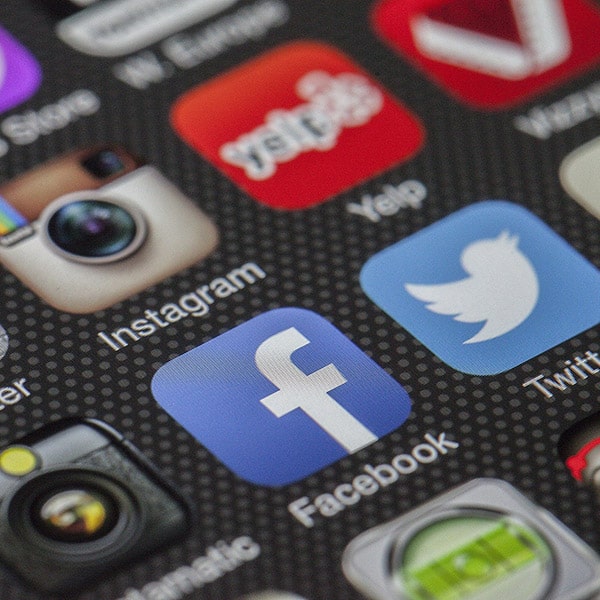 Social Media App Icons on Smartphone Screen