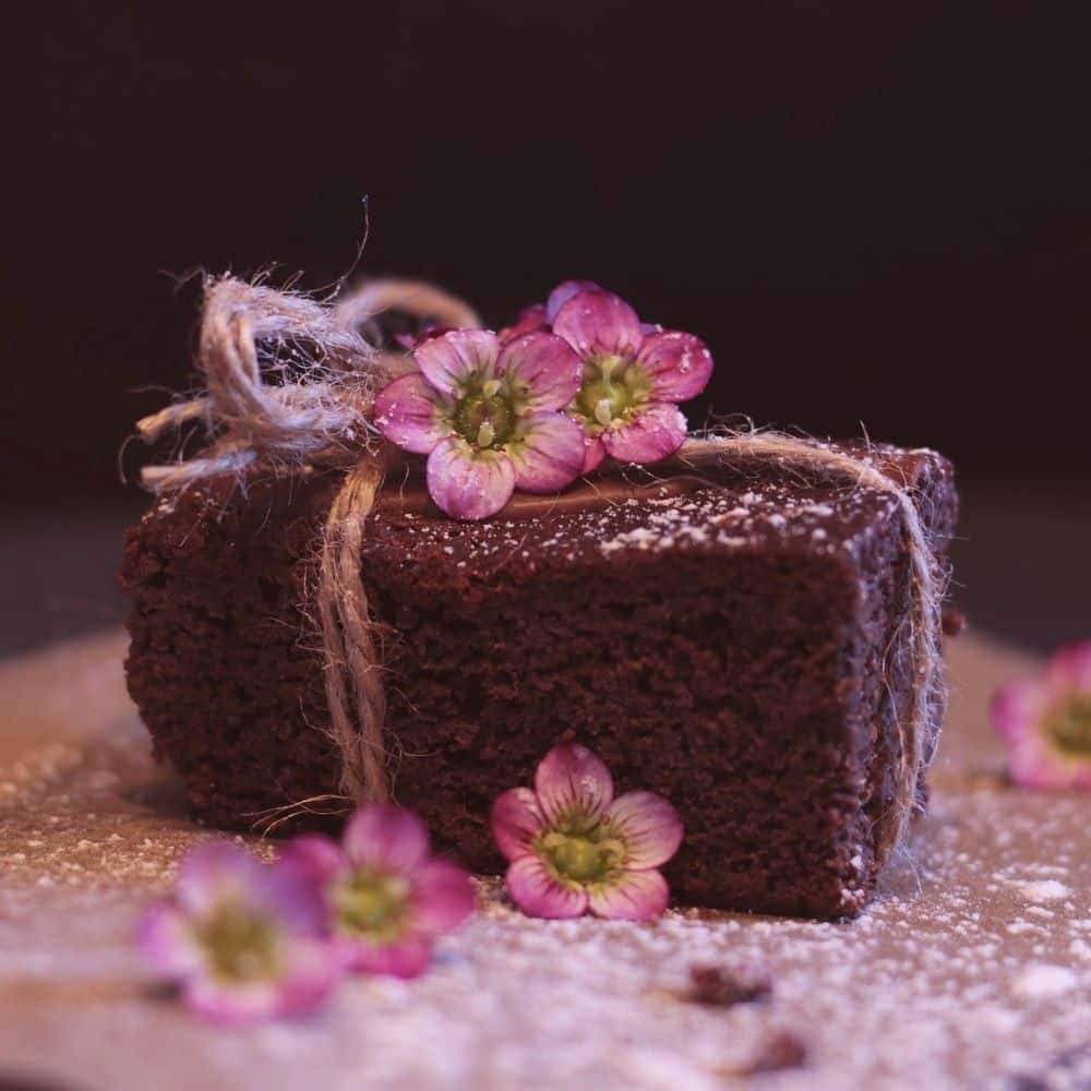 Chocolate Cake with Pink Flowers and Twine Decoration