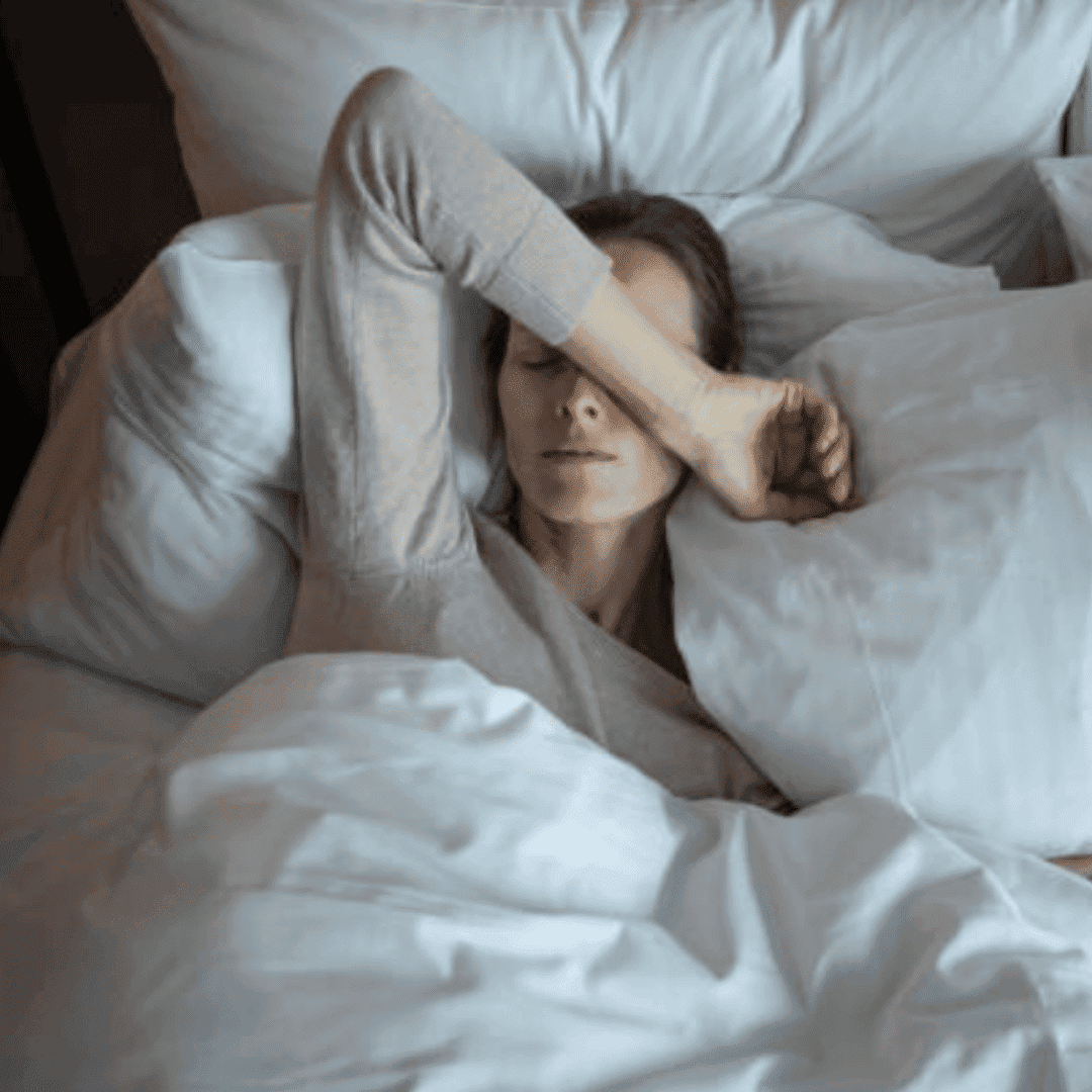 Restful Woman Sleeping in Bed