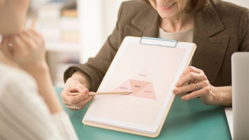 Professional coaching session on sleep improvement techniques.