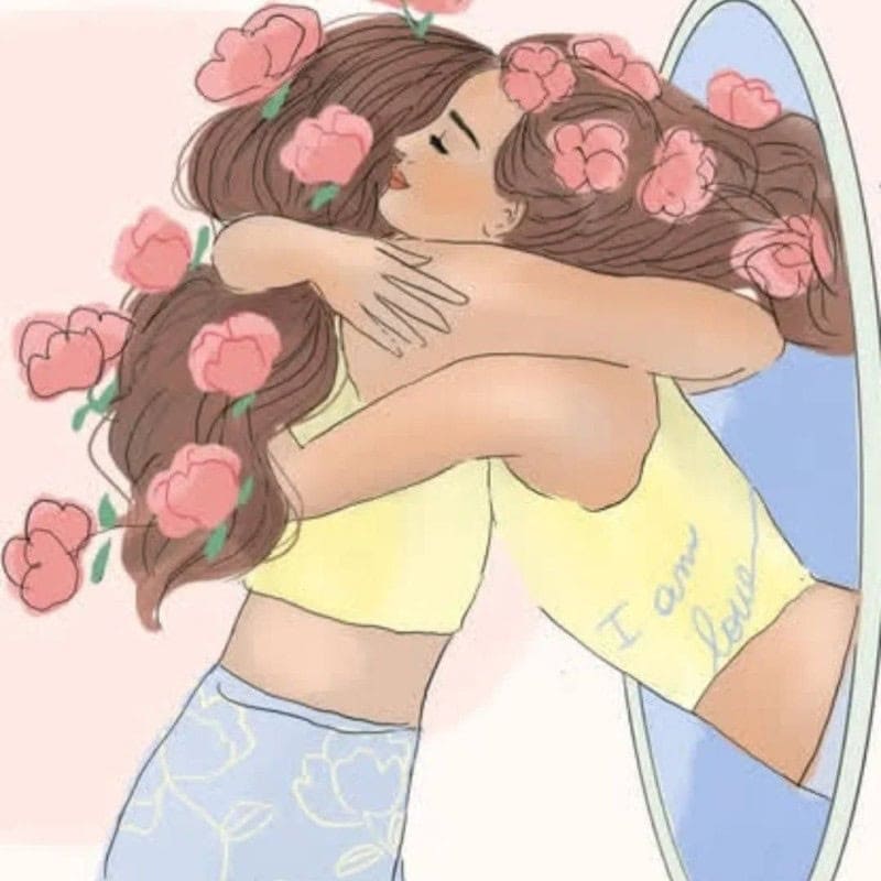 Warm embrace between two women with flowers in their hair, expressing love and affection.